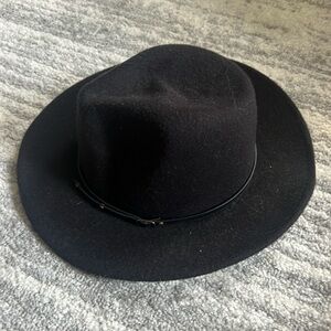 Black felt brim hat with strip gently used